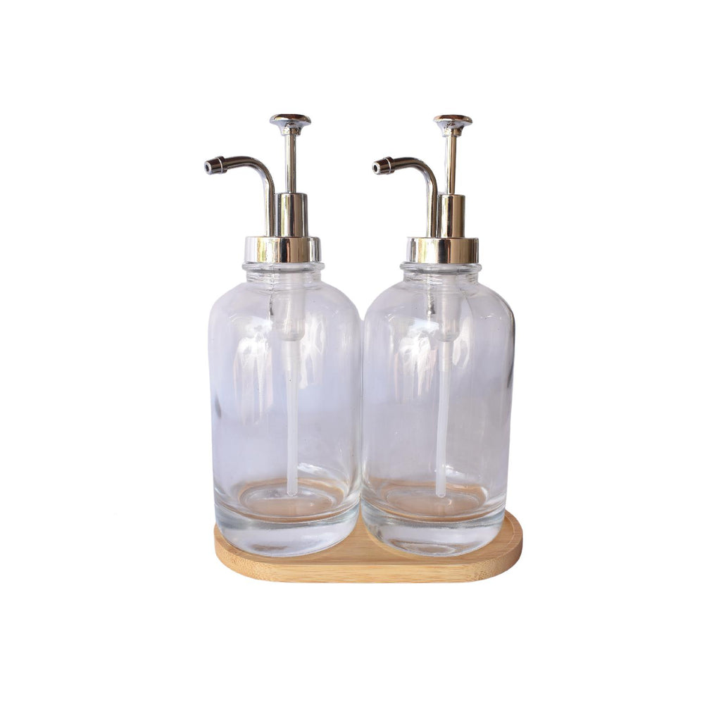 Clear and silver dispenser set with bamboo tray