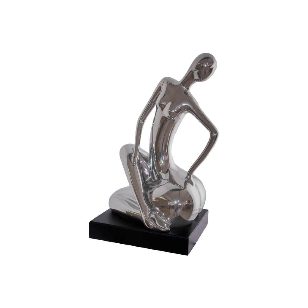 Silver sitting figurine