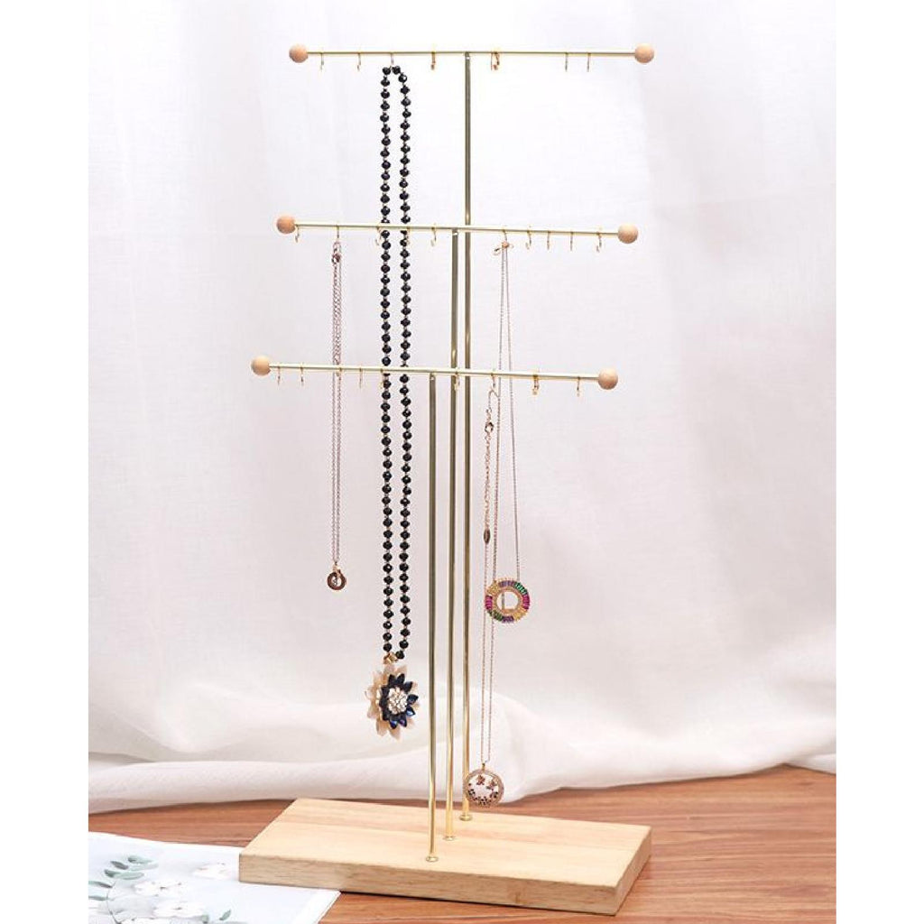 Tiered gold necklace display