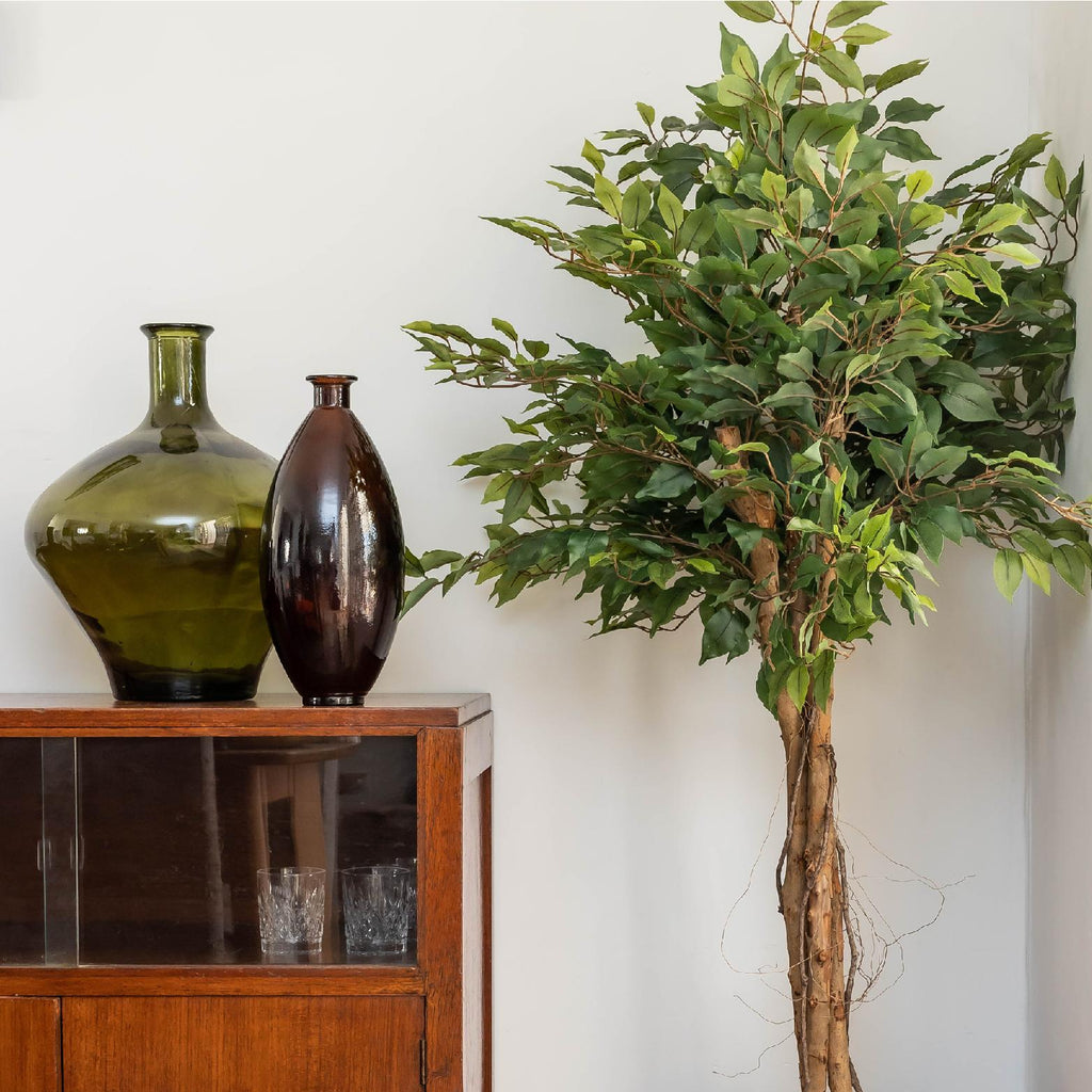 Artificial ficus tree with twisted stems